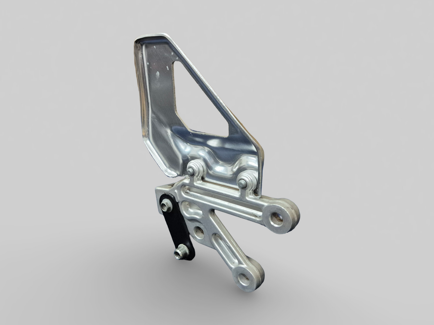 SUPPORT DE REPOSE-PIEDS AVANT GAUCHE AP8154069 Aprilia RSV1000R 04-10 / Tuono 1000R 06-10