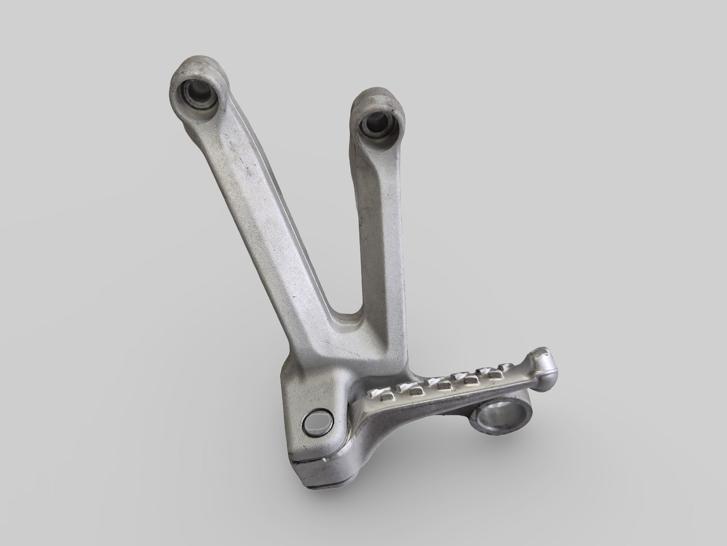 LEFT-HAND PASSENGER FOOTREST SUPPORT AP8154071 Aprilia RSV1000R 04-10 / Tuono 1000R 06-10