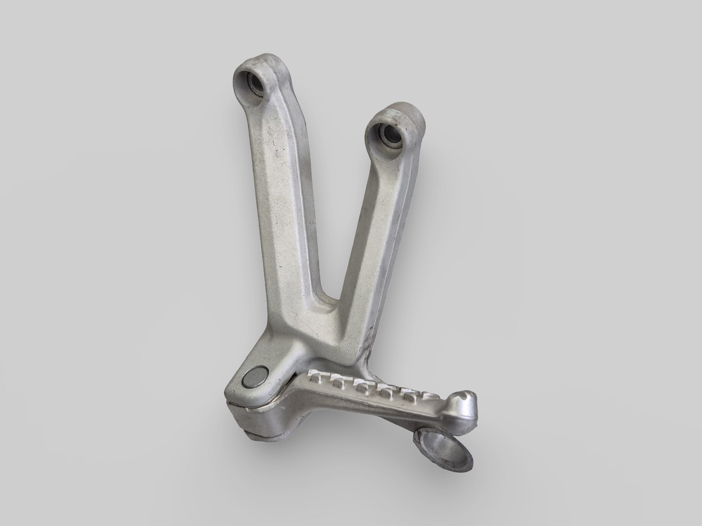 LEFT-HAND PASSENGER FOOTREST SUPPORT AP8154071 Aprilia RSV1000R 04-10 / Tuono 1000R 06-10