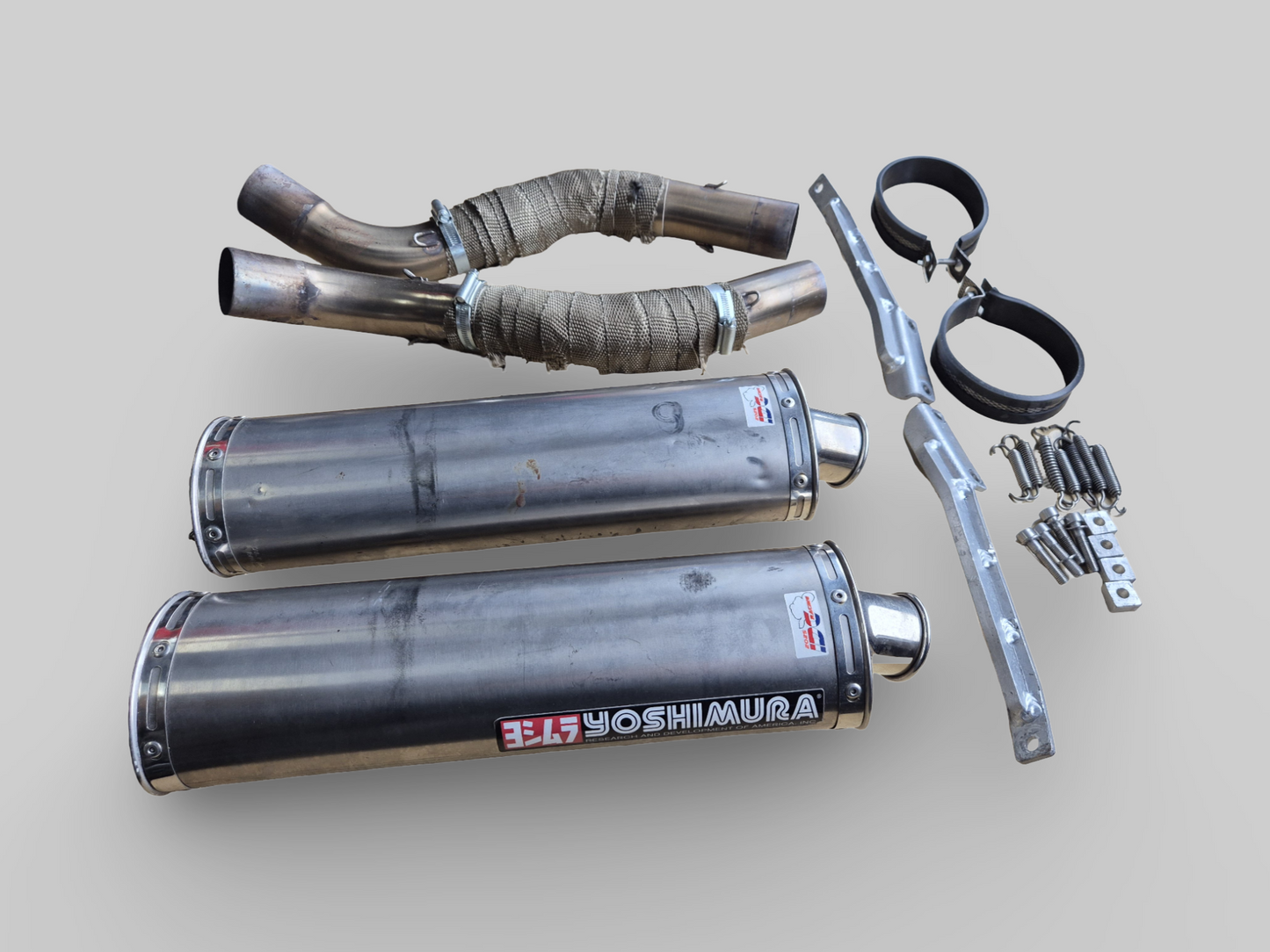 YOSHIMURA HIGH-MOUNT EXHAUST SLIP-ON DUAL SET Aprilia RSV1000R 04-09 / RSV TUONO 1000R 06-09