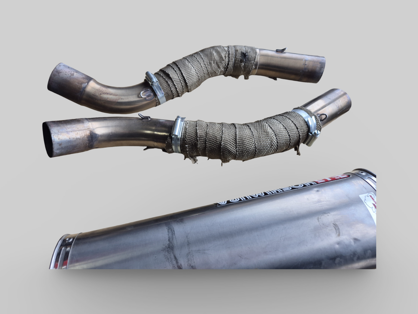 YOSHIMURA HIGH-MOUNT EXHAUST SLIP-ON DUAL SET Aprilia RSV1000R 04-09 / RSV TUONO 1000R 06-09