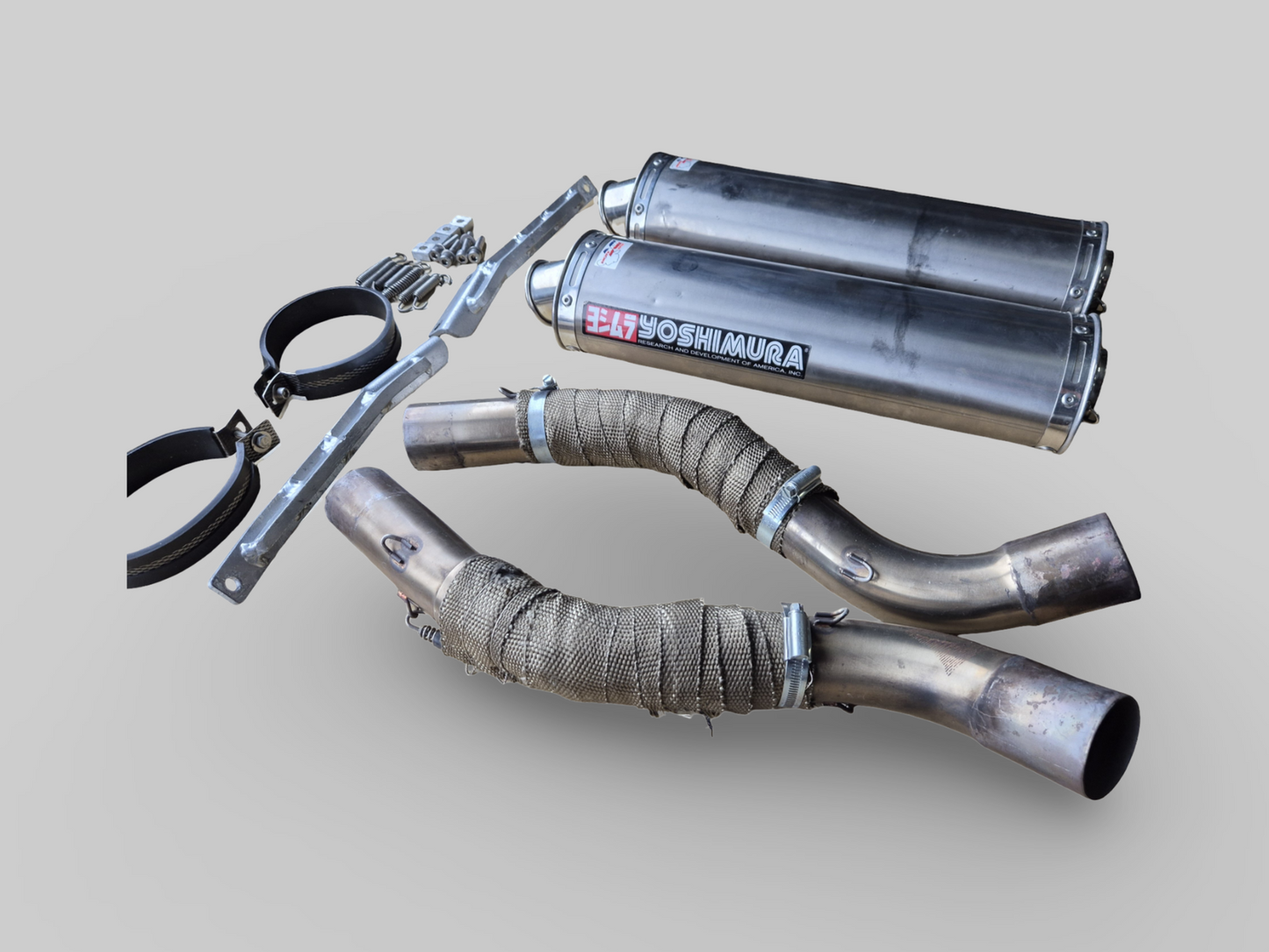 YOSHIMURA HIGH-MOUNT EXHAUST SLIP-ON DUAL SET Aprilia RSV1000R 04-09 / RSV TUONO 1000R 06-09