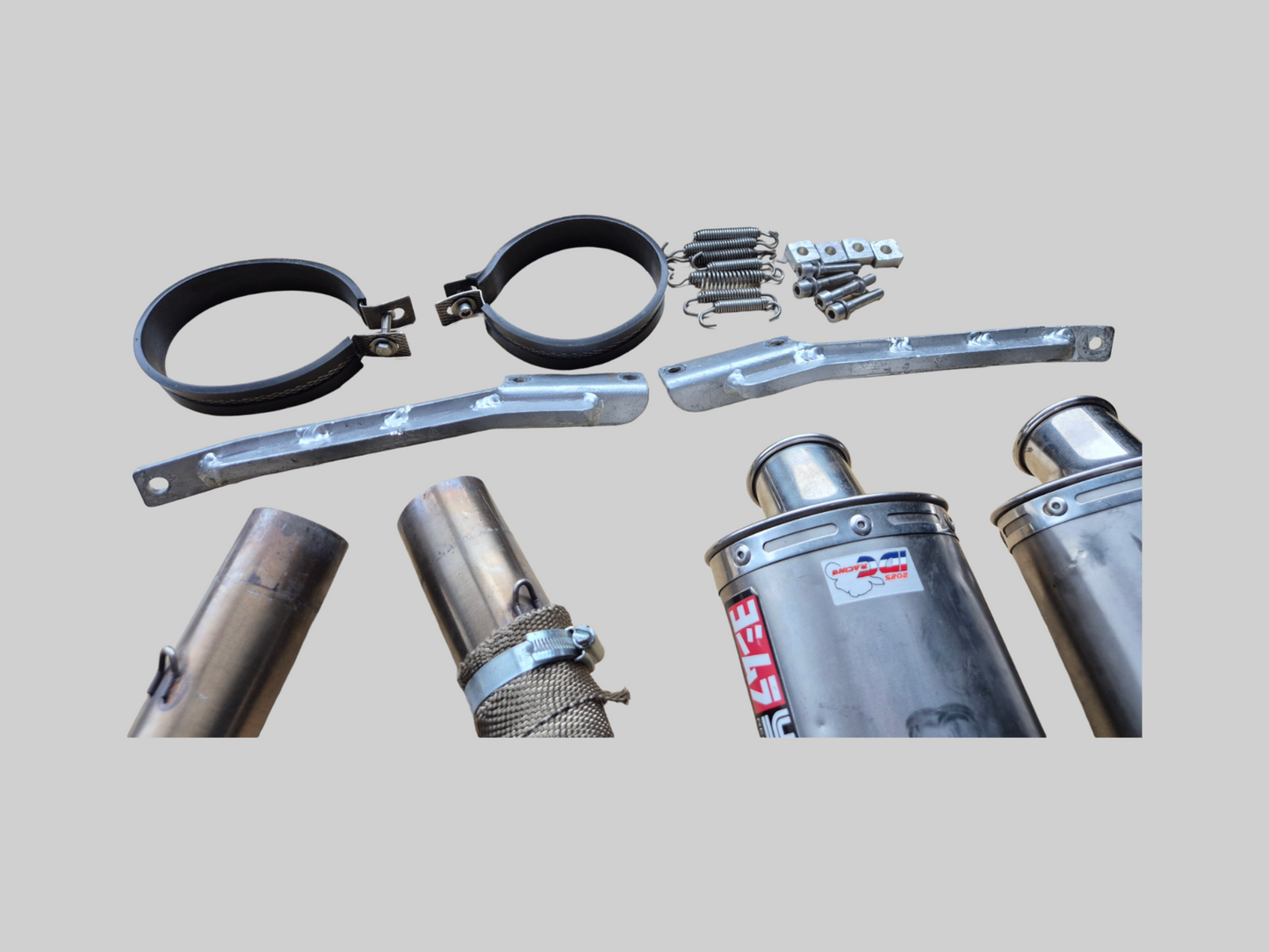 YOSHIMURA HIGH-MOUNT EXHAUST SLIP-ON DUAL SET Aprilia RSV1000R 04-09 / RSV TUONO 1000R 06-09