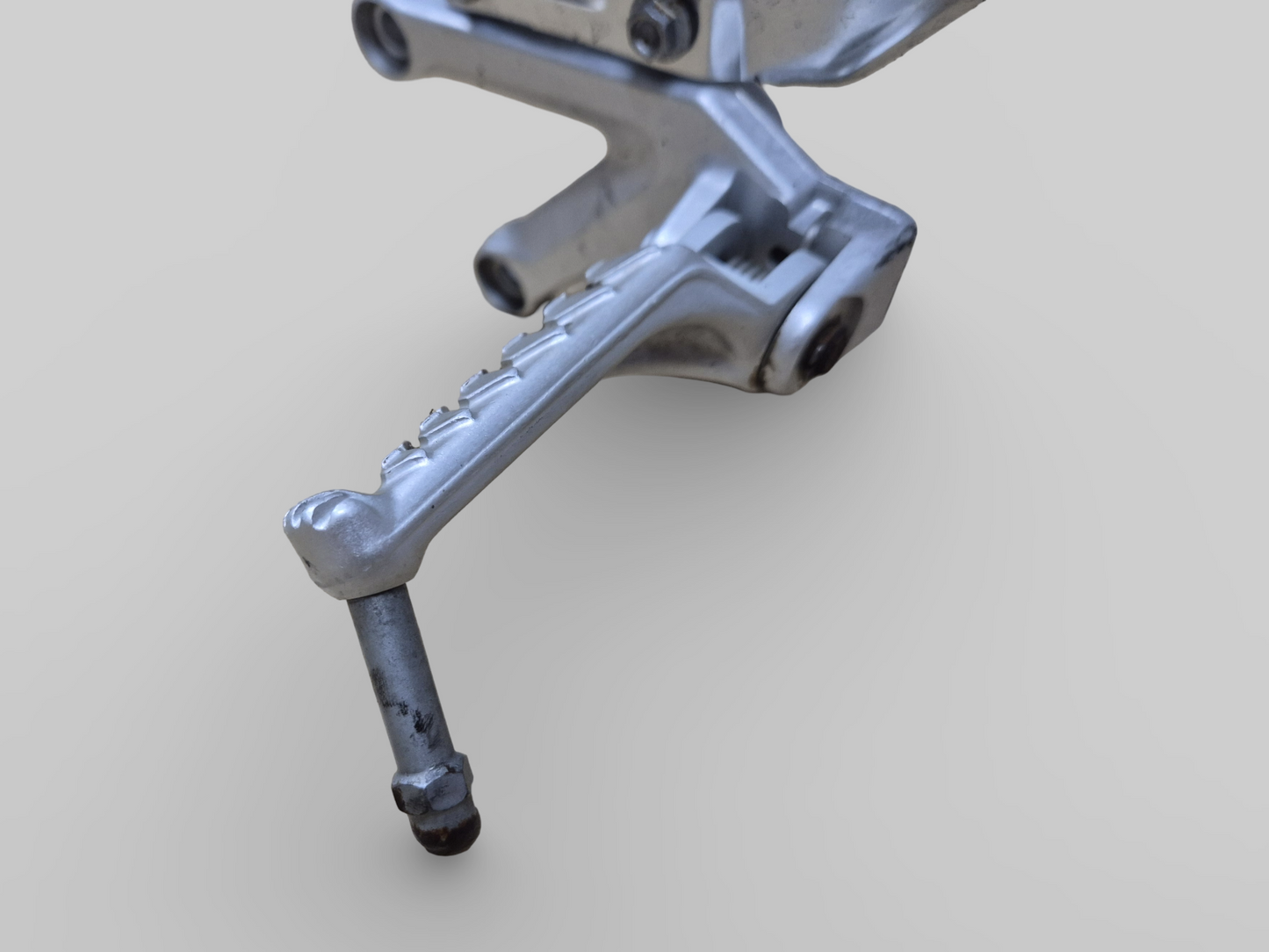 LEFT-HAND FRONT FOOTREST SUPPORT REARSET AP8154069 Aprilia RSV1000R 04-10 / Tuono 1000R 06-10