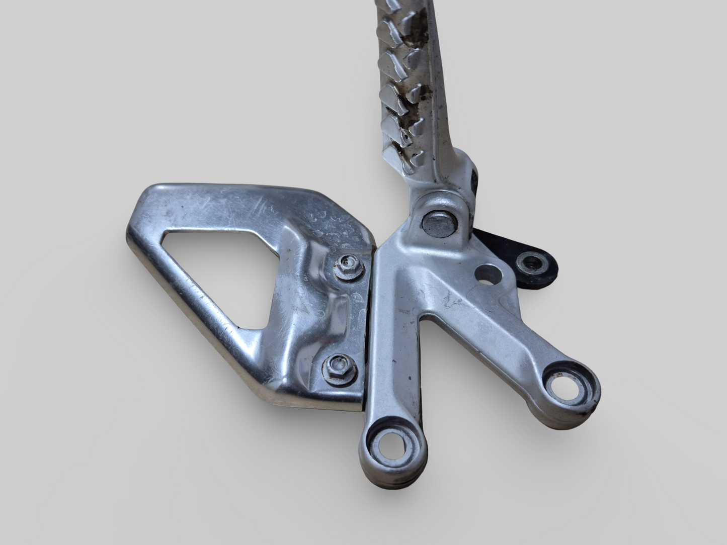 LEFT-HAND FRONT FOOTREST SUPPORT REARSET AP8154069 Aprilia RSV1000R 04-10 / Tuono 1000R 06-10